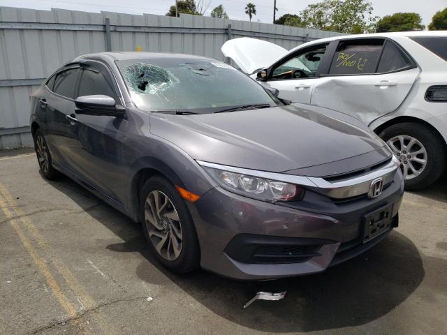 HONDA CIVIC EX 2018 with VIN 2HGFC2F71JH535211 - Photo from auction