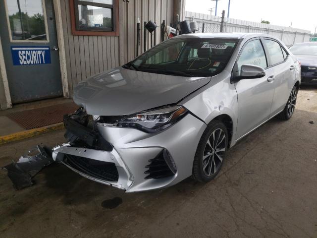 Photo 2 from auction – 2017 TOYOTA COROLLA L with VIN 5YFBURHE2HP623395