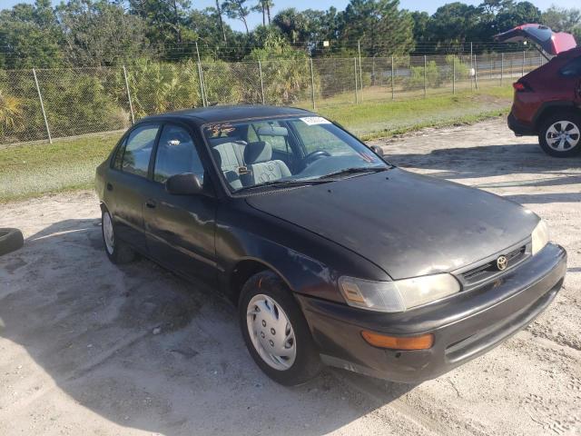 TOYOTA COROLLA BA 1997 with VIN 1NXBA02E4VZ661833 - Photo from auction