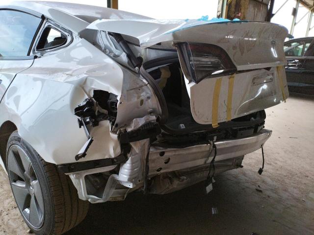 Photo 9 from auction – 2021 TESLA MODEL 3 with VIN 5YJ3E1EB6MF999889