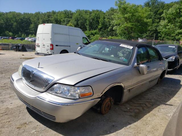 Photo 2 from auction – 2004 LINCOLN TOWN CAR E with VIN 1LNHM81W14Y629603