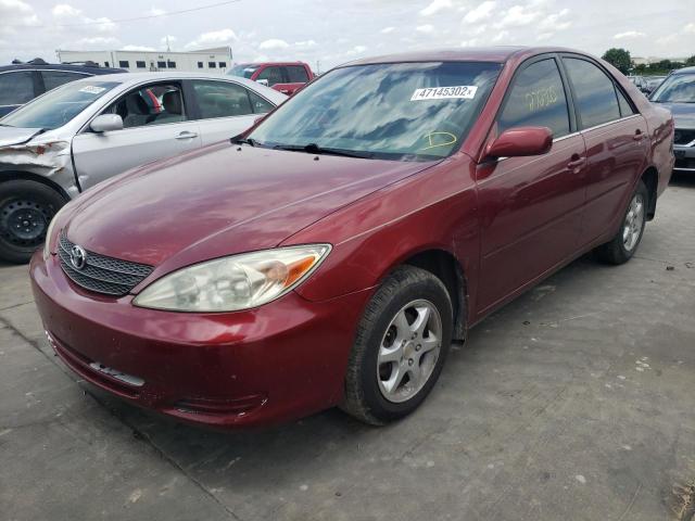 Photo 2 from auction – 2002 TOYOTA CAMRY LE with VIN JTDBE30K920021722