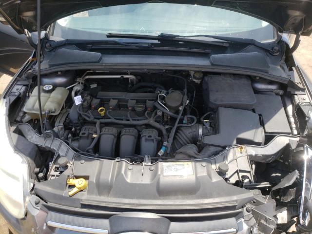Foto 7 de la subasta – 2014 FORD FOCUS SE con VIN 1FADP3K29EL244173