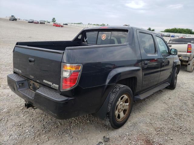 Photo 4 from auction – 2006 HONDA RIDGELINE with VIN 2HJYK16286H558979