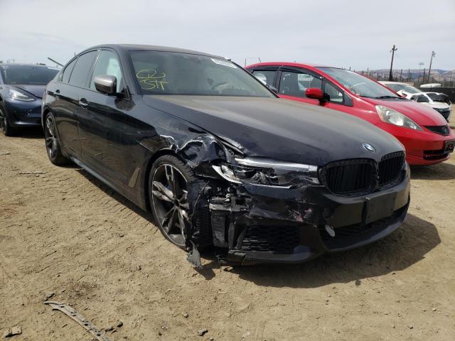 BMW M550XI 2018 with VIN WBAJB9C52JB036494 - Photo from auction