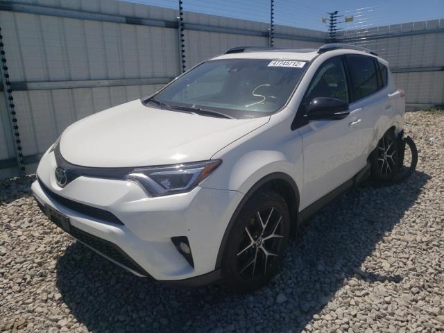 Photo 2 from auction – 2018 TOYOTA RAV4 SE with VIN JTMJFREV1JJ181780