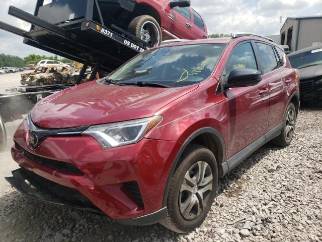 Photo 2 from auction – 2018 TOYOTA RAV4 LE with VIN 2T3ZFREV9JW472113