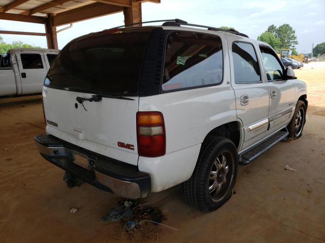 Photo 4 from auction – 2002 GMC YUKON with VIN 1GKEC13Z42R296477
