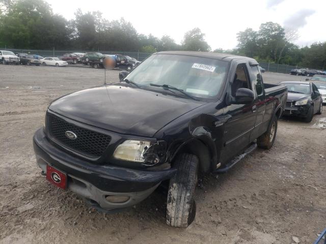 Photo 2 from auction – 2002 FORD F150 with VIN 1FTRX18W82NA84978