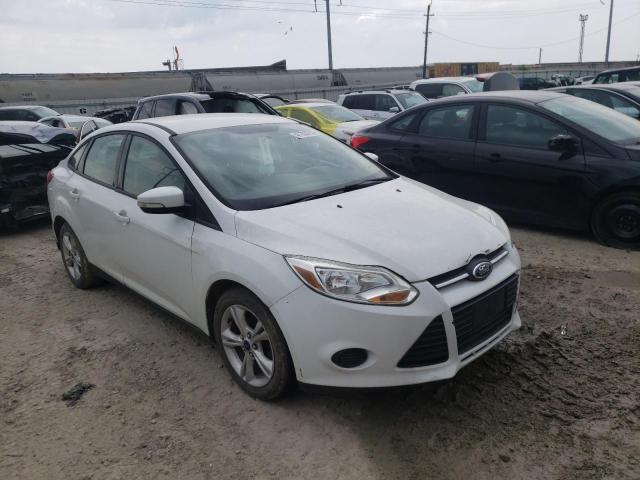 FORD FOCUS SE 2014 with VIN 1FADP3F20EL459810 - Photo from auction