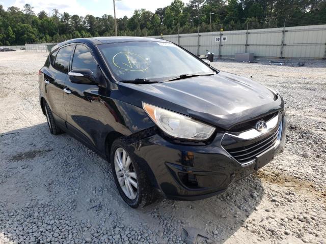 HYUNDAI TUCSON LIM 2012 with VIN KM8JUCAC2CU380518 - Photo from auction