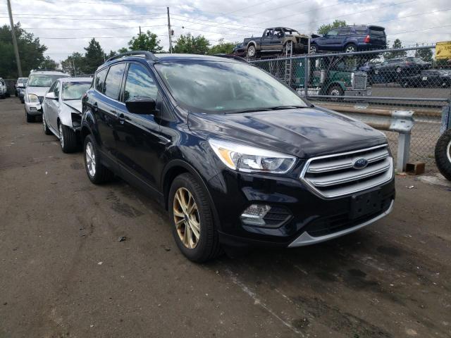 FORD ESCAPE SE 2018 with VIN 1FMCU0GD8JUC32698 - Photo from auction
