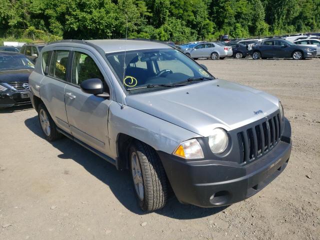 JEEP COMPASS 2010 with VIN 1J4NF4FB9AD591423 - Photo from auction