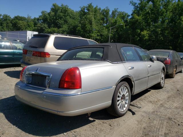 Photo 4 from auction – 2004 LINCOLN TOWN CAR E with VIN 1LNHM81W14Y629603