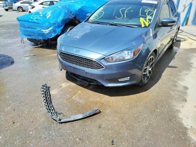 Photo 9 from auction – 2018 FORD FOCUS SEL with VIN 1FADP3H25JL255897