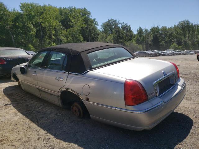 Photo 3 from auction – 2004 LINCOLN TOWN CAR E with VIN 1LNHM81W14Y629603