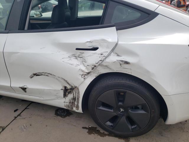 Photo 9 from auction – 2021 TESLA MODEL 3 with VIN 5YJ3E1EA0MF976874