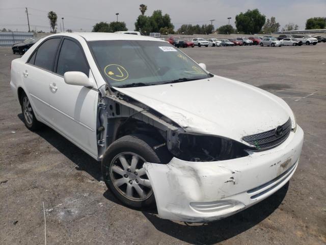 TOYOTA CAMRY LE 2002 with VIN 4T1BF32K62U016864 - Photo from auction