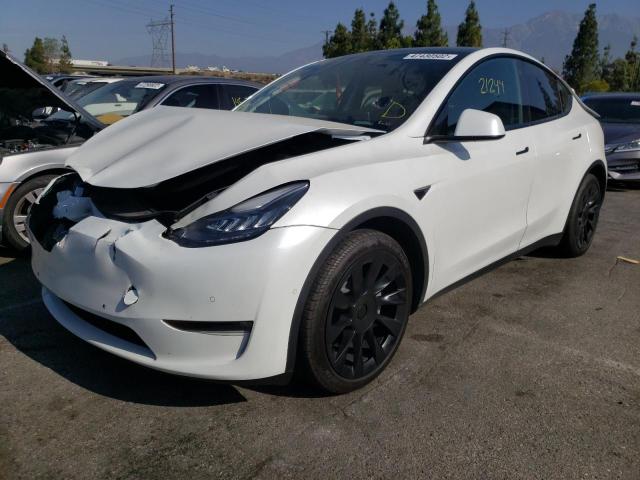 Photo 2 from auction – 2021 TESLA MODEL Y with VIN 5YJYGAEE1MF180346