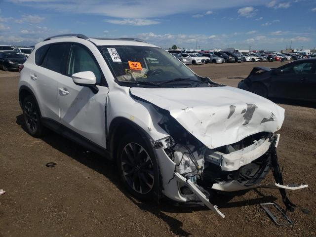 MAZDA CX-5 GT 2016 with VIN JM3KE4DYXG0772993 - Photo from auction