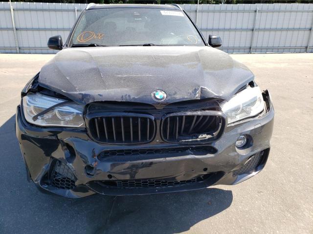 Photo 9 from auction – 2015 BMW X5 XDRIVE5 with VIN 5UXKR6C52F0J79030