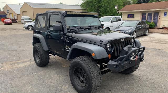 JEEP WRANGLER S 2013 with VIN 1C4AJWAG7DL698255 - Photo from auction