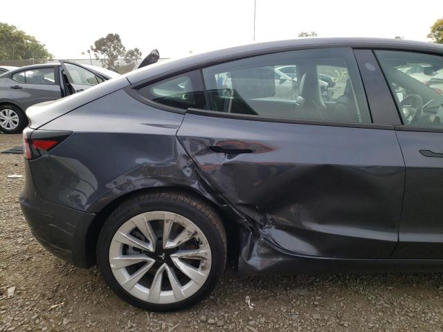 Photo 9 from auction – 2022 TESLA MODEL 3 with VIN 5YJ3E1EA1NF185416