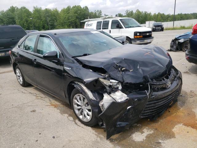 TOYOTA CAMRY HYBR 2015 with VIN 4T1BD1FK5FU168564 - Photo from auction