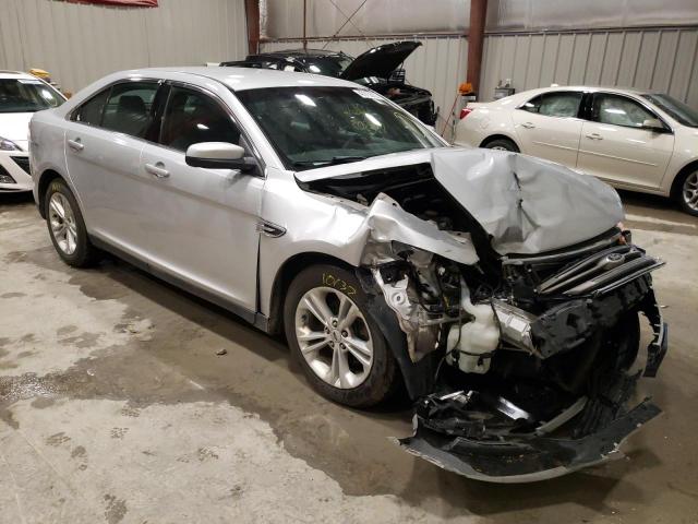 FORD TAURUS SEL 2014 with VIN 1FAHP2H8XEG154563 - Photo from auction