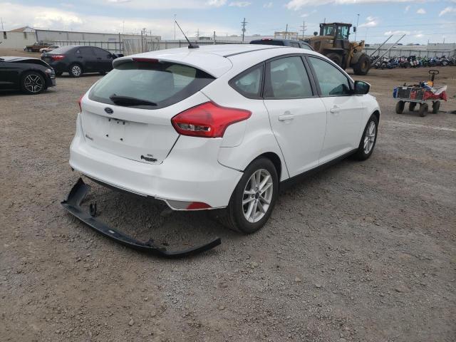 Photo 4 from auction – 2018 FORD FOCUS SE with VIN 1FADP3K27JL331077