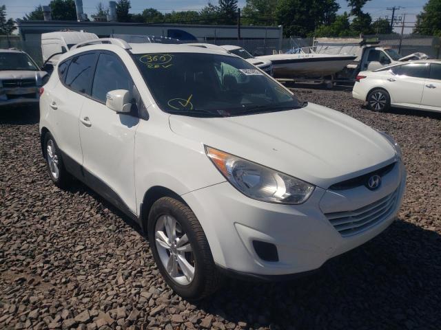 HYUNDAI TUCSON GLS 2012 with VIN KM8JUCAC1CU370062 - Photo from auction