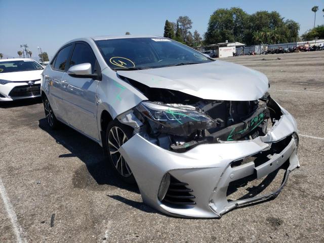 TOYOTA COROLLA L 2017 with VIN 5YFBURHE4HP673408 - Photo from auction