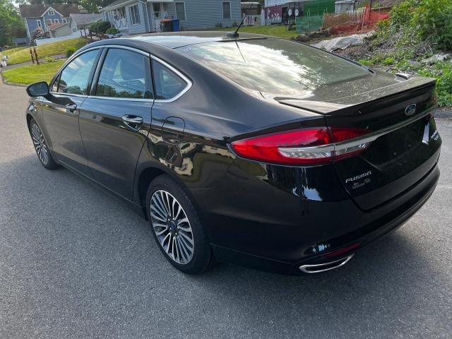 Photo 4 from auction – 2018 FORD FUSION TIT with VIN 3FA6P0D91JR142668