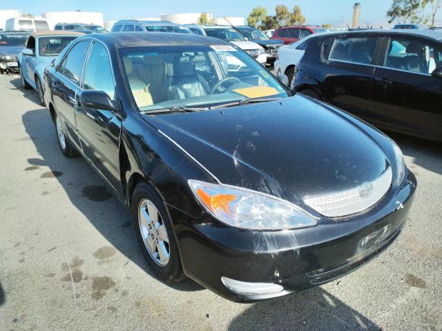 TOYOTA CAMRY LE 2004 with VIN 4T1BF30K94U074781 - Photo from auction