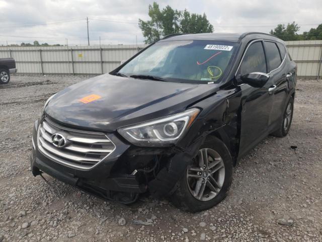 Photo 2 from auction – 2017 HYUNDAI SANTA FE S with VIN 5NMZU3LB0HH015409
