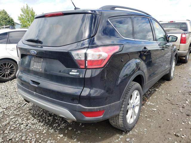 Photo 4 from auction – 2018 FORD ESCAPE SE with VIN 1FMCU9GD8JUA86470