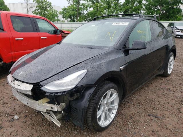 Photo 2 from auction – 2021 TESLA MODEL Y with VIN 5YJYGDEE9MF066564