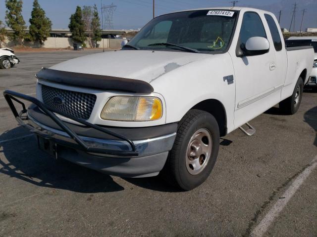 Photo 2 from auction – 1999 FORD F150 with VIN 1FTRX17W2XKB69633