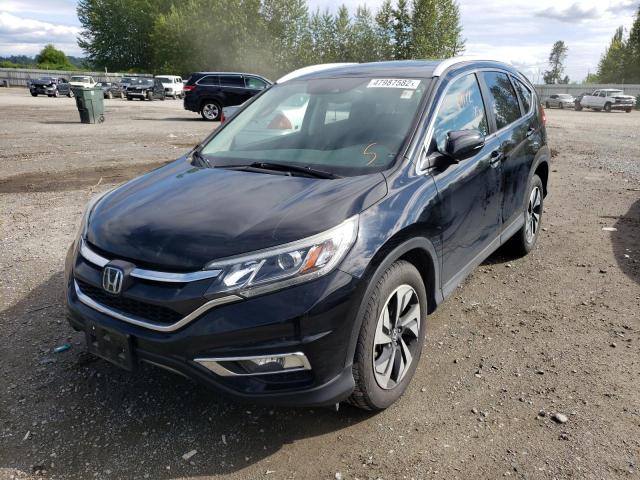 Photo 2 from auction – 2016 HONDA CR-V TOURI with VIN 5J6RM4H95GL090562