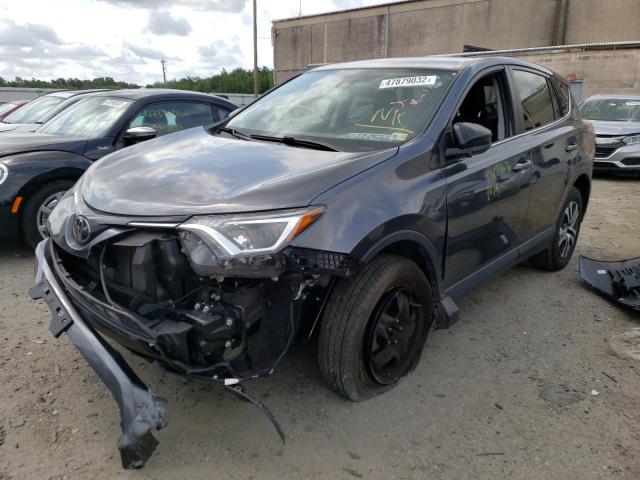 Photo 2 from auction – 2018 TOYOTA RAV4 LE with VIN JTMBFREV7JD251964