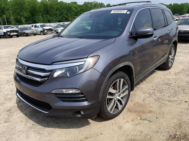 Photo 2 from auction – 2016 HONDA PILOT TOUR with VIN 5FNYF5H95GB054732