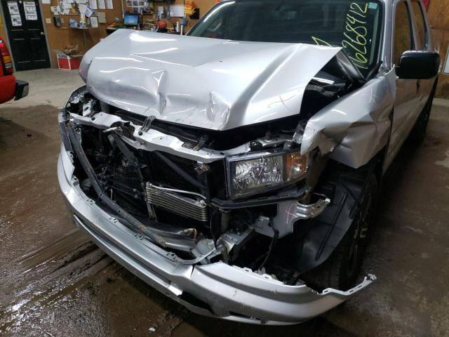 Photo 9 from auction – 2014 HONDA RIDGELINE with VIN 5FPYK1F75EB014645