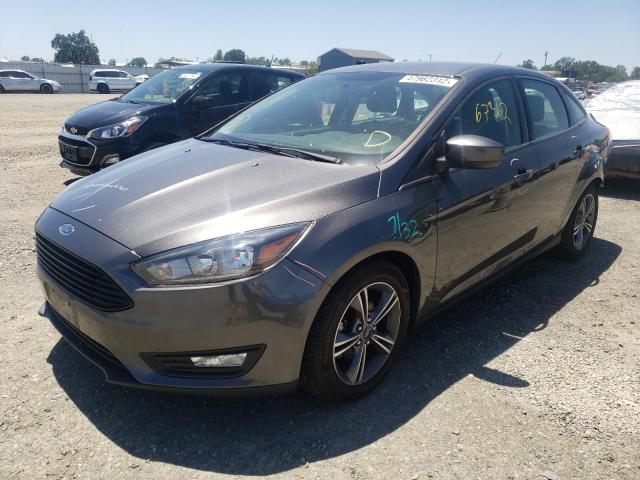 Photo 2 from auction – 2018 FORD FOCUS SE with VIN 1FADP3FE5JL271174