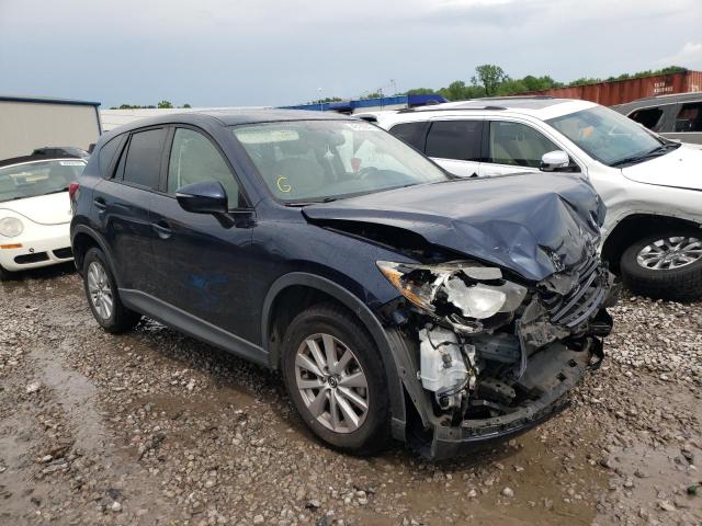 MAZDA CX-5 TOURI 2016 with VIN JM3KE2CYXG0818960 - Photo from auction