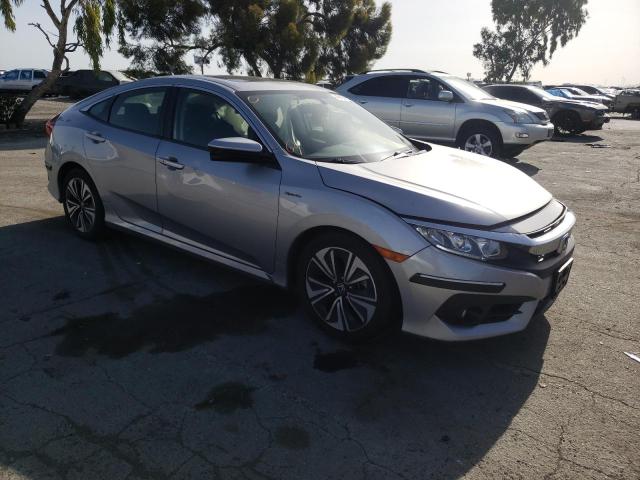 HONDA CIVIC EX 2018 with VIN JHMFC1F35JX009387 - Photo from auction