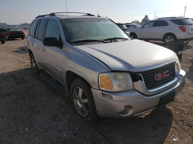 GMC ENVOY 2004 with VIN 1GKDT13SX42338130 - Photo from auction