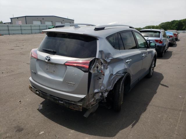 Photo 4 from auction – 2018 TOYOTA RAV4 LIMIT with VIN 2T3DFREV2JW722818