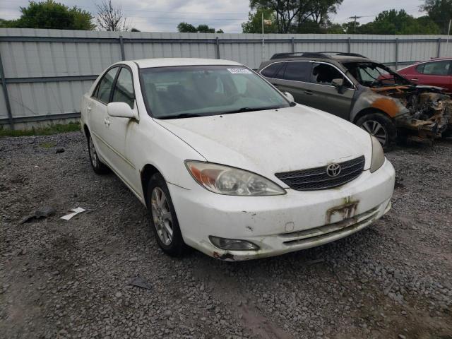 TOYOTA CAMRY LE 2004 with VIN JTDBE32K640245532 - Photo from auction