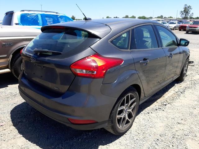 Photo 4 from auction – 2018 FORD FOCUS SEL with VIN 1FADP3M25JL271183