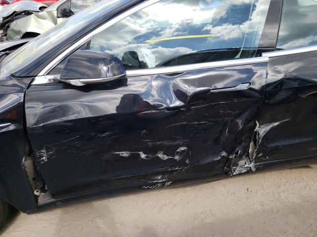 Photo 9 from auction – 2018 TESLA MODEL 3 with VIN 5YJ3E1EB4JF113385